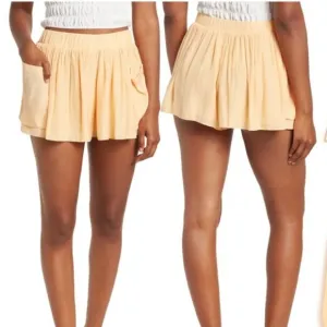 Ramy Brook August Mini Pleated Shorts Nectar Orange Side Pouch Pockets Small NEW