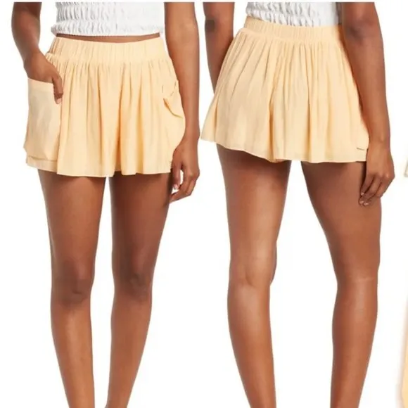 Ramy Brook August Mini Pleated Shorts Nectar Orange Side Pouch Pockets Small NEW