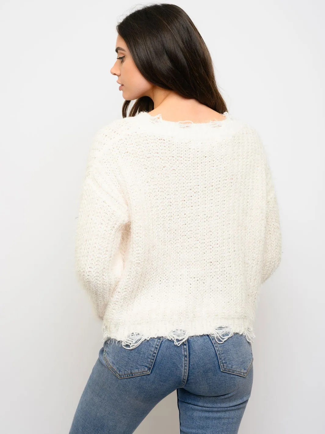 WOMEN'S DISTRESS HEM SWEATER