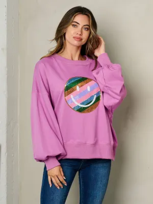 WOMEN'S LONG SLEEVE GRAPHIC SWEATER